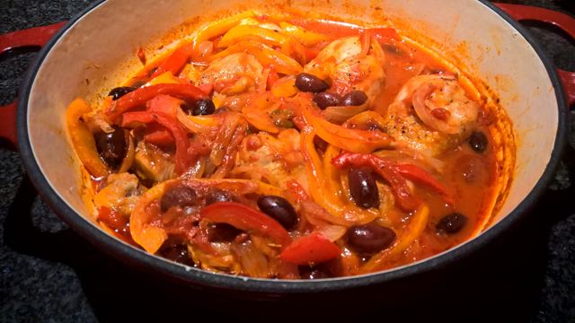 Braised chicken with peppers, olives and capers
