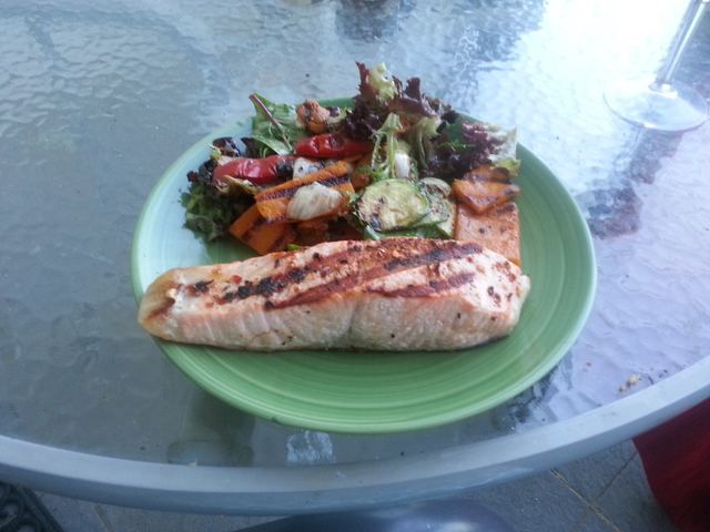 Grilled salmon with harissa vegetable salad