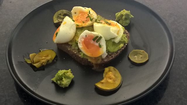 Oozing eggs on smashed avo toast